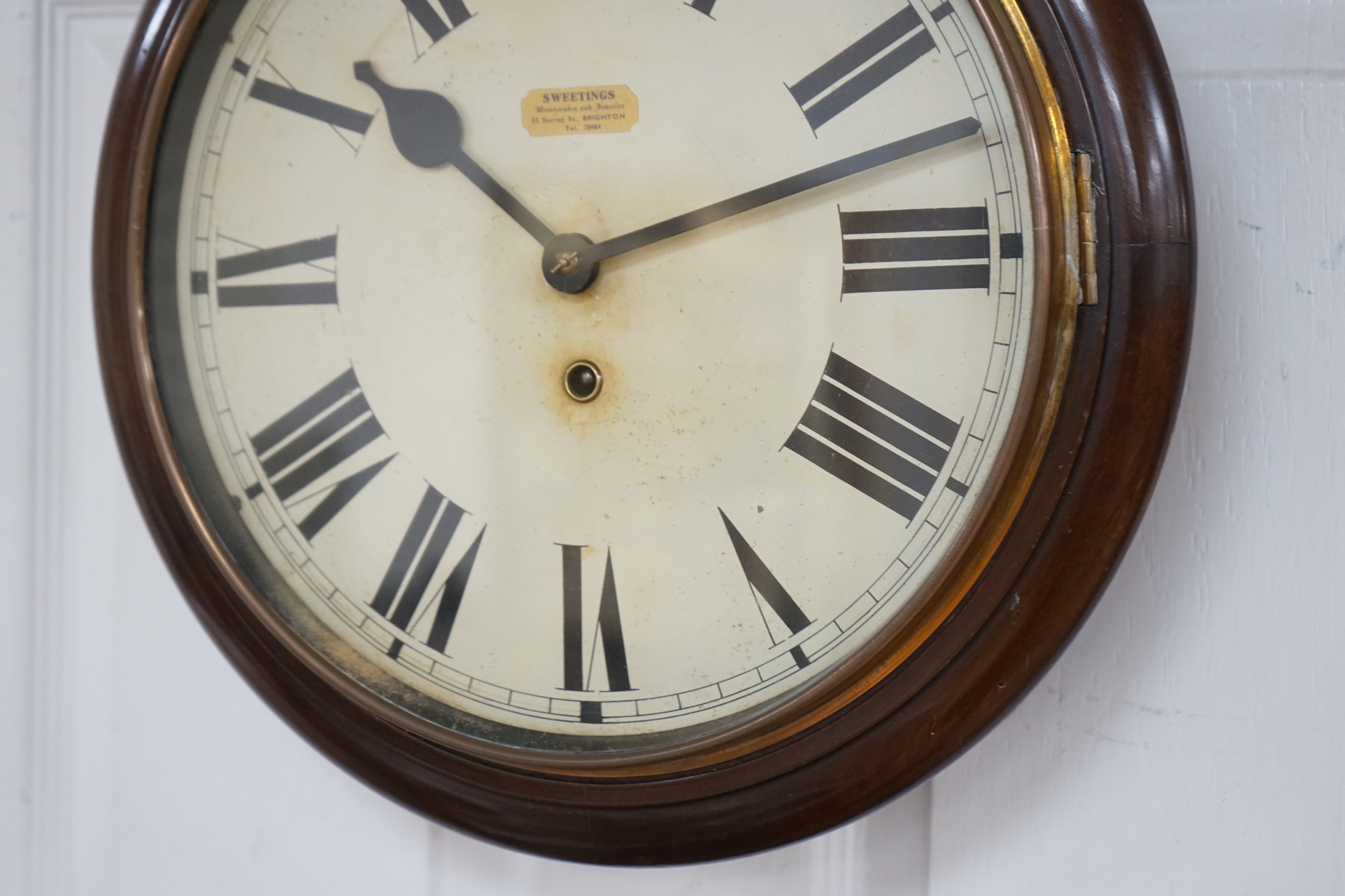 An early 20th century mahogany wall clock, 37cm diameter